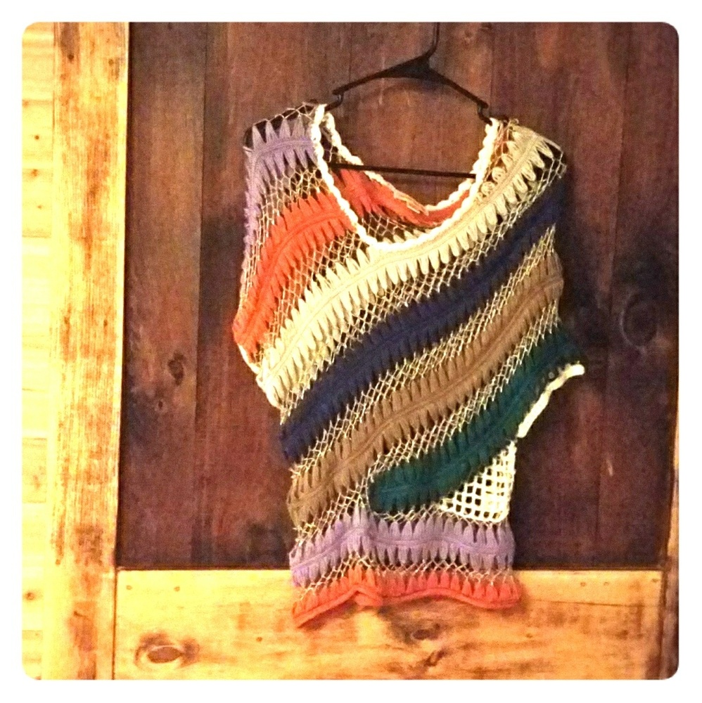 Holey, boho woven top